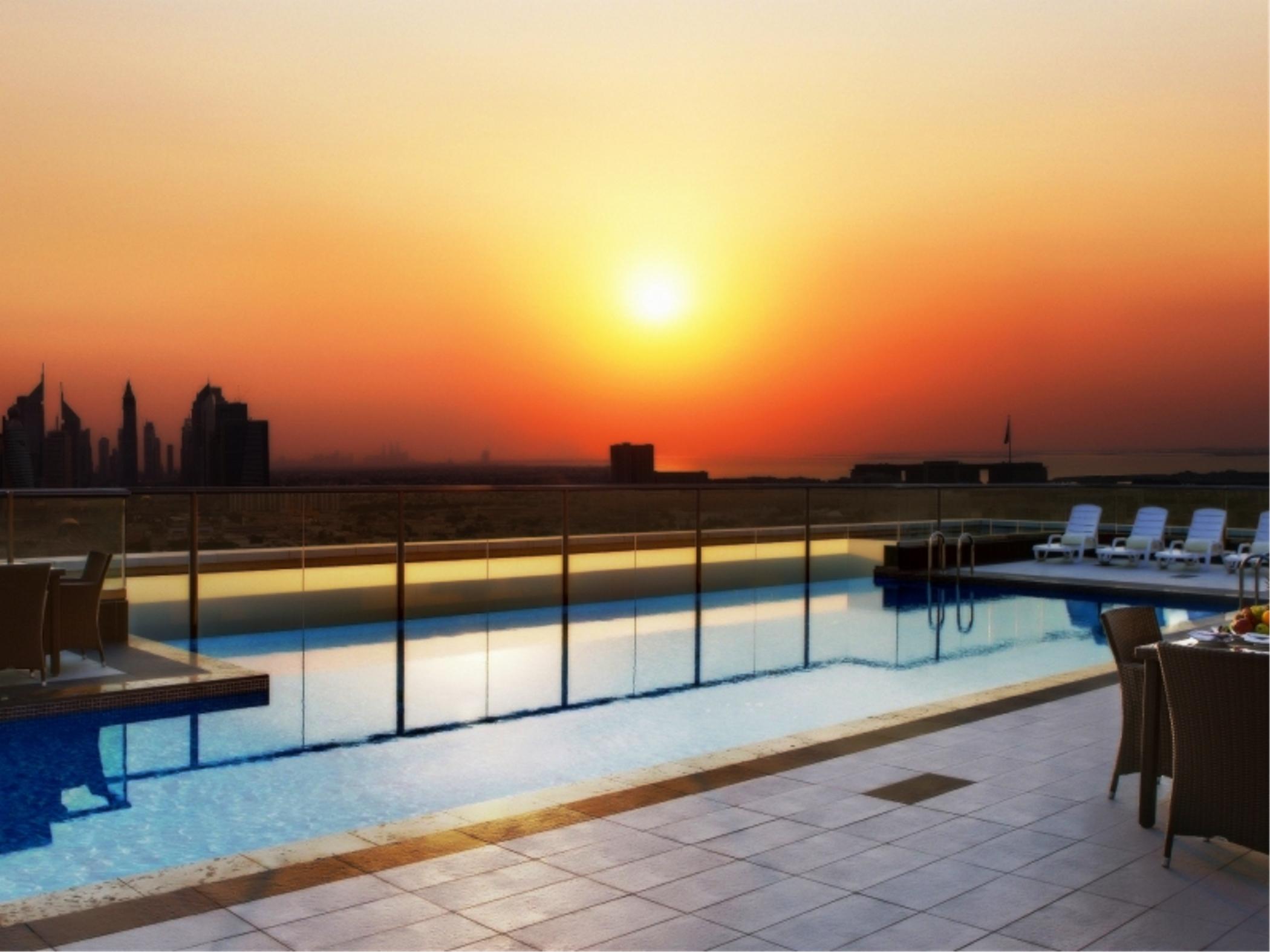 Park Regis Kris Kin Hotel Dubai Exterior photo The swimming pool at the top of the hotel